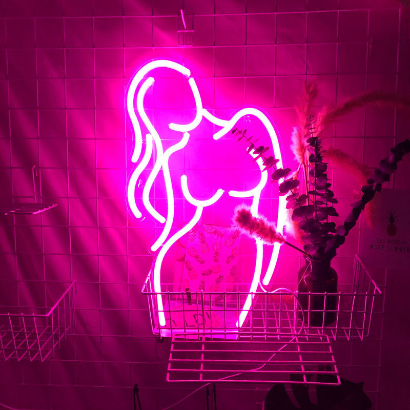 Acrylic Lady LED Neon Sign Lights Wall in pink, shaped as a stylized female silhouette, mounted on a grid wall with USB power for home decor lighting.
